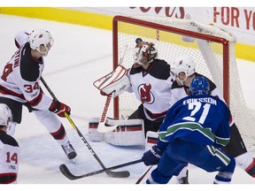 Loui Eriksson scores  against the Devils' Cory Schneider.