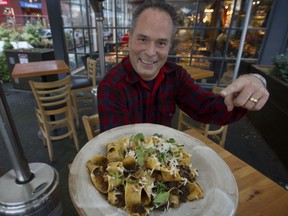 Eric Pateman president and chef at Edible Canada with dish of Newfoundland seal pappardelle on Vancouver's Granville Island.  It's part of the Dine Out Vancouver menu.