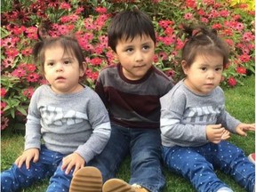 David Lemus (middle) is flanked by his twin sisters Leslie and Elena in this family photo. The east Vancouver home where these kids and their parents were living was destroyed in a fire caused by space heaters on Thursday. Elena has died as a result of her injuries. The others survived though are being treated for burns and smoke inhalation.