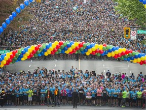 File: Participants start the 32nd Annual Vancouver Sun Run on Georgia Street in Vancouver, B.C. Sunday April 17, 2016.