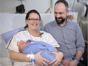 Dana and Peter Harlos with their baby Montgomery, who was born just after midnight on Jan. 1, 2017, at BC Women's Hospital in Vancouver.