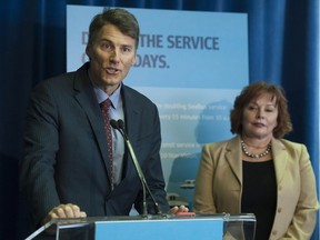 Three levels of government plus representatives from Translink, transit unions and stakeholders took part in a press conference to announce further transit expansion and service improvements for the Lower Mainland. Pictured are Vancouver Mayor Gregor Robertson and Surrey Mayor Linda Hepner.