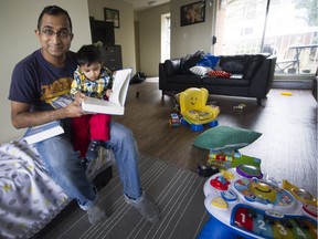 Rony Das with 18-month-old son Sayantan at their home on the UBC Endowment Lands. He is among a growing trend of mature students coming to Canada with their families.