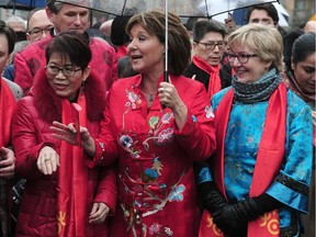 Premier Christy Clark, centre, attends the 44th annual Lunar New Year Parade in Vancouver with other politicians on Sunday.