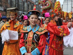 The annual Chinatown parade turns Pender Street into a festival of noise and colour  in Vancouver  on February 22, 2015.