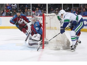 DENVER, CO - JANUARY 25: Markus Granlund #60 of the Vancouver Canucks scores against Goaltender Calvin Pickard #31 of the Colorado Avalanche at the Pepsi Center on January 25, 2017 in Denver, Colorado.