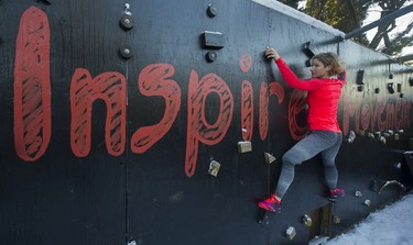 Fitness trainer Allison Tai moves through a portion of the obstacle course built in her east Vancouver backyard.
