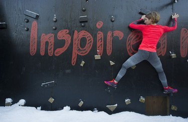 Fitness trainer Allison Tai moves through a portion of the obstacle course built in her east Vancouver backyard.