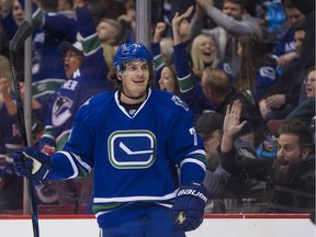 VANCOUVER January 06 2017.  Vancouver Canucks #21 Loui Eriksson smiles after scoring on the Calgary Flames in the first period of a regular season NHL hockey game at Rogers Arena, Vancouver, January 06 2017.  Gerry Kahrmann  /  PNG staff photo) ( Prov / Sun Sports ) 0007239A  [PNG Merlin Archive]