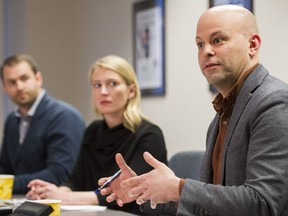 Uber Canada's Adam Blinick (R) , Michael Van Hemmen (L) and Susie Heath (C) , meet the The Vancouver Sun/The Province editorial board  January 17 2017.