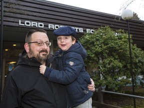 Tom Wiebe and his son Trajan outside Lord Robert Annex.