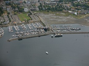 An aerial photo of the small craft harbour at Comox. A kayaker who capsized and became separated from his boat in Comox Harbour on Friday morning has died.