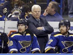 St. Louis Blues head coach Ken Hitchcock watches during the second period in Game 2 of the NHL hockey Stanley Cup Western Conference finals against the San Jose Sharks, Tuesday, May 17, 2016, in St. Louis. The St. Louis Blues have fired head coach Hitchcock. THE CANADIAN PRESS/AP, Jeff Roberson