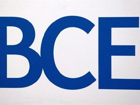 BCE Inc. logo is shown at the company&#039;s annual general meeting in Montreal, Thursday, May 6, 2010. BCE Inc. says its common share dividend will be increased by 5.1 per cent this year, starting with the first quarterly payment on April 15, following an improved profit in the fourth quarter and 2016 as a whole. THE CANADIAN PRESS/Graham Hughes