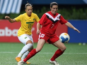 Canada&#039;s Rhian Wilkinson, right, fights for the ball with Brazil&#039;s Thais Guedes during a women&#039;s soccer match at the Pan American Games in Guadalajara, Mexico, Saturday, Oct. 22, 2011. Away from the soccer pitch, Wilkinson has walked part of the Camino de Santiago, run a marathon and crewed a yacht in the Mediterranean in recent years. THE CANADIAN PRESS/AP, Juan Karita
