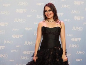 Tanya Tagaq poses on the red carpet during the 2015 Juno Awards in Hamilton, Ont., on Sunday, March 15, 2015. Award-winning Canadian singer Tagaq says she has been temporarily suspended from Facebook because of a photo of seal fur.THE CANADIAN PRESS/Peter Power
