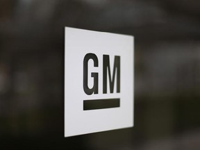 FILE - This Friday, May 16, 2014, file photo, shows the General Motors logo at the company&#039;s world headquarters in Detroit. On Feb. 7, 2017, GM reports financial results. (AP Photo/Paul Sancya, File)