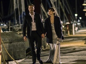 This image released by Universal Pictures shows Dakota Johnson as Anastasia Steele, right, and Jamie Dornan as Christian Grey in &ampquot;Fifty Shades Darker.&ampquot; (Doane Gregory/Universal Pictures via AP)