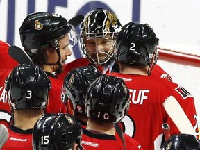 Ottawa Senators goalie Craig Anderson (41) celebrates with teammates after defeating the New York Islanders in NHL hockey action in Ottawa on, Saturday February 11, 2017. THE CANADIAN PRESS/Fred Chartrand