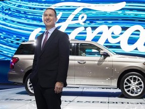 Ford Canada&#039;s new president and CEO says the company&#039;s financial commitment to auto manufacturing in Canada has not wavered since the election of U.S. President Donald Trump. Ford Canada President Mark Buzzell poses in front of the 2017 Ford Expedition during the Canadian International Autoshow, in Toronto on Thursday, February 16, 2017. THE CANADIAN PRESS/Mark Blinch