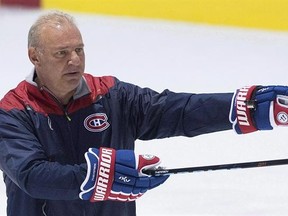 Montreal Canadiens head coach Michel Therrien gives instructions to players during training camp in Brossard, Que., Friday, September 23, 2016. Two days after being fired by the Montreal Canadiens, Michel Therrien says being an NHL coach is a tough job that is &ampquot;gratifying on many levels but it can also quickly become a thankless task. THE CANADIAN PRESS/Graham Hughes