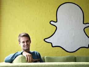 FILE - In this Thursday, Oct. 24, 2013, file photo, Snapchat CEO Evan Spiegel poses for a photo in Los Angeles. Snap Inc. is listing the company‚Äôs valuation at up to $22 billion as it prepares for the tech industry‚Äôs biggest initial public offering in years. The parent company of SnapChat said in a regulatory filing Thursday, Feb. 16, 2017, that the IPO is likely to be priced between $14 and $16 per share. (AP Photo/Jae C. Hong, File)