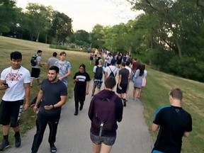 In this July 2016 photo, throngs of people take to Lake Park in Milwaukee, while playing Pokemon Go, shortly after the release of the popular smartphone game. The Milwaukee County Board has approved an ordinance requiring creators of smartphone games such as Pokemon Go to get a permit before they can use park locations. (Michael Meidenbauer/Milwaukee Journal-Sentinel via AP)