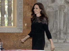 Hollywood actress Angelina Jolie arrives for a press conference in Siem Reap province, Cambodia, Saturday, Feb. 18, 2017. Jolie on Saturday launches her two-day film screening of &ampquot;First They Killed My Father&ampquot; in Angkor complex in the Siem Reap province. (AP Photo/Heng Sinith)