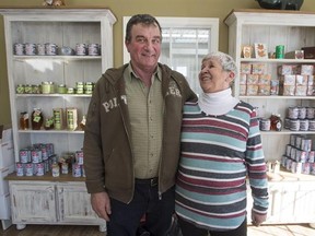 Nicole Varin and her husband Harold Varin, pose for a photo in the boutique at there sugar shack Friday, February 10, 2017 in Oka, Quebec. Quebec, the world&#039;s largest producer of maple syrup, is ramping up output as it fends off rising competition from the U.S. and neighbouring provinces as well as a farmer rebellion from within. THE CANADIAN PRESS/Ryan Remiorz
