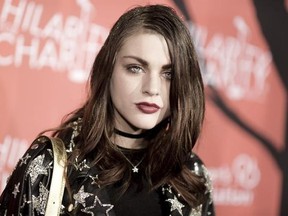 FILE - In this Oct. 15, 2016, file photo, Frances Bean Cobain attends the 5th Annual Hilarity for Charity Variety Show: Seth Rogen&#039;s Halloween in Los Angeles. Cobain posted a tribute to her late father Kurt Cobain on what would have been his 50th birthday on Feb. 20, 2017. (Photo by Richard Shotwell/Invision/AP, File)
