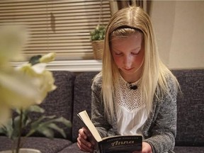 In this photo taken on Thursday, Feb. 23, 2017, 10 year-old Anna Thulin-Myge poses with one of her favorite books in Haugesund, Norway. Anna was born a boy but is now legally a girl. Only Malta and Norway allow children to swap gender without a doctor&#039;s agreement or intervention. She says changing in the girls&#039; locker room and using the girls&#039; bathroom at school makes her feel included. (AP Photo/Odin Omland)