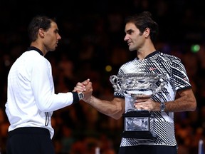 Rafael Nadal of Spain (left) congratulates Roger Federer of Switzerland after Federer won their epic five-set men’s final match at the Australian Open tennis tournament in Melbourne, Australia, last weekend.