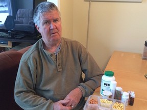 Barry Mansfield, a former teacher in Hope, has Parkinson's disease, and is trying to get funding for a new drug to help his symptoms. Here he is with his drugs.