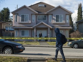 Burnaby RCMP investigate a possible murder at a residence in the 7900-block 18th Avenue in Burnaby, BC Thursday, February 23, 2017.