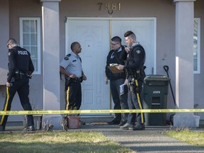 Burnaby RCMP investigate a possible murder at a residence in the 7900-block 18th Avenue in Burnaby, BC Thursday, February 23, 2017.