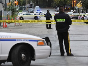 The trial of a teen who shot and killed a man in Burnaby in 2014 has begun. Photo shows crime scene at Lougheed Highway and Rosser in Burnaby on September 25, 2014.