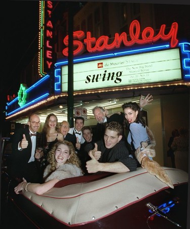 In 1998, the cast of the musical ‘Swing’ pile into a 1939 Buick for the official reopening of the Stanley Theatre on Granville. In the foreground, with two thumbs up, is a young singer named Michael Buble. Directly behind Buble is the show's director Bill Millerd.
