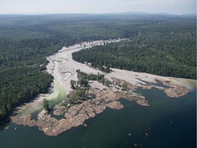 Contents from a tailings pond are pictured going down the Hazeltine Creek into Quesnel Lake near the town of Likely on Aug. 5, 2014. It was two years since millions of cubic metres of mine waste gushed from the pond at the Mount Polley mine in B.C.'s Interior.