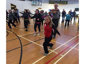 Olympian Lynn Kanuka of SportMedBC put Sun Run InTraining Clinic leaders through their paces at Burnaby Secondary School. She’s a fan of cross-training, but says 'in order to be a better runner, you mostly have to run.'