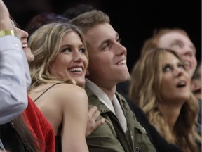 Smile for the birdie! Canadian tennis star Genie Bouchard on her blind date with John Goehrke Wednesday night at New York’s Barclays Center for an NBA game between the host Brooklyn Nets and the Milwaukee Bucks. After losing a Super Bowl bet to Goehrke on Twitter, Bouchard agreed to go on a date with him.