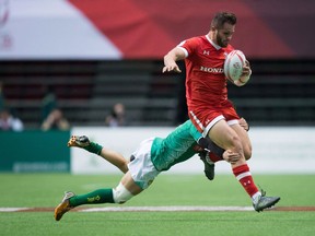 Canada's Admir Cejvanovic, front, is tackled by Brazil's Gustavo Albuquerque during World Rugby Sevens Series' Canada Sevens tournament action, in Vancouver, B.C., on Sunday March 13, 2016. Admir Cejvanovic doesn't remember much about the refugee camp nestled on the border of Croatia and his native Bosnia.Just a toddler at the time, he lived there with his mother under the protection of the United Nations for about six months as the Balkan region descended into a series of wars in the early 1990s.