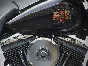 Over two dozen complete or partial motorcycles, including custom Harley-Davidsons, were forfeited.