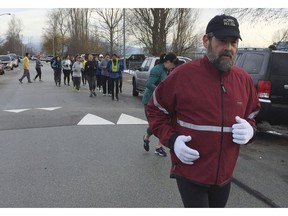 Former Vancouver Sun reporter Jeff Lee, right, trains with his Vancouver Sun InTraining group in New Westminster. The former 'fitness nut' is excited to be back preparing for the 33rd annual Vancouver Sun Run.