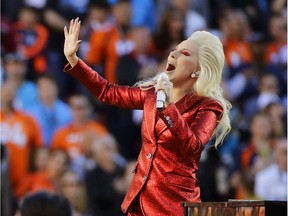 Lady Gaga sings the national anthem before Super Bowl 50 last year. This year, she's performing at the halftime show and there are even odds she'll mention President Donald Trump at some point.