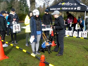 During Saturday's RunGo Dash for Dogs at Stanley Park, people were blindfolded to have a chance to experience how guide dogs work. There was a guided run/walk around the park.
