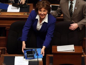 Premier Christy Clark arrives before B.C. Finance Minister Michael de Jong arrives to deliver a balanced budget for a fifth year in a row at Legislative Assembly in Victoria, B.C. Tuesday, February 21, 2017.