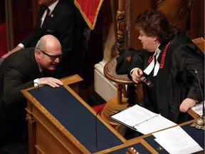 B.C. Finance Minister Michael de Jong and Speaker of the House Hon. Linda Reid speak before delivering a balanced budget for a fifth year in a row at Legislative Assembly in Victoria Tuesday.