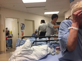 Patients (faces blurred to protect identity) are lined up in the ER department in Abbotsford Hospital., in 2016.