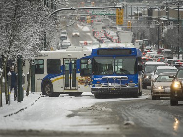 Friday's snowstorm saw many transit buses stuck on city roads. CMBC buses do not use snow tires.