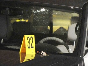 Kevin LeClair's bullet-ridden truck after he was fatally shot at the Thunderbird Village Mall on Feb. 6, 2009.
